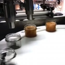 Máquina automática de llenado y taponado de mermeladas, cremas alimentarias y cosmética