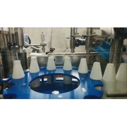 Máquina automática de llenado y taponado