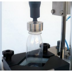 Cerradora semiautomática de tapas de aluminio twist-off y plásticas