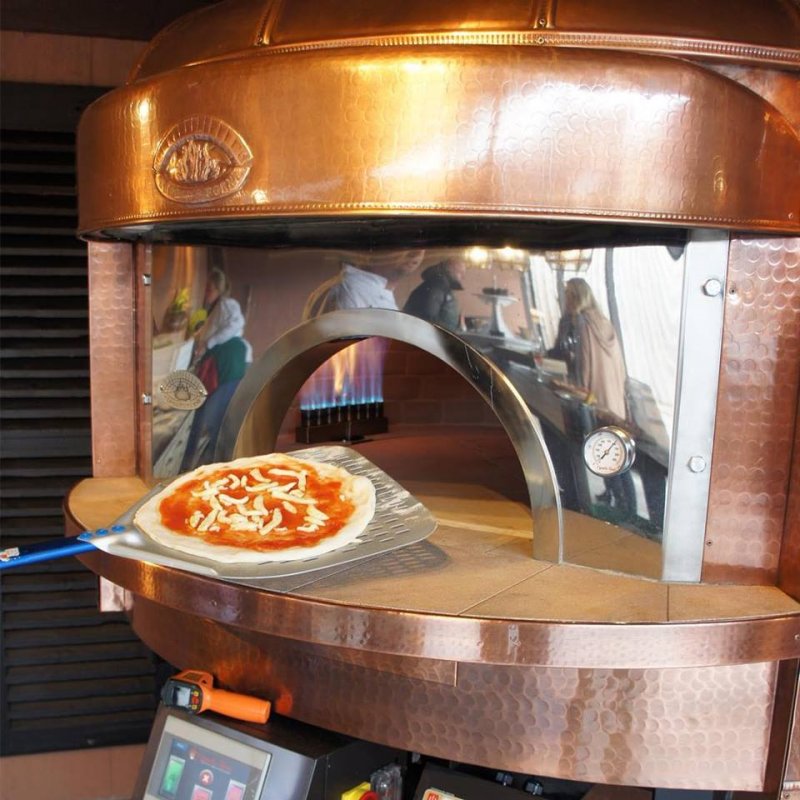 Horno rotativo para pizza Napolitana a leña, gas, pellets o combinado. Cobre tradicion